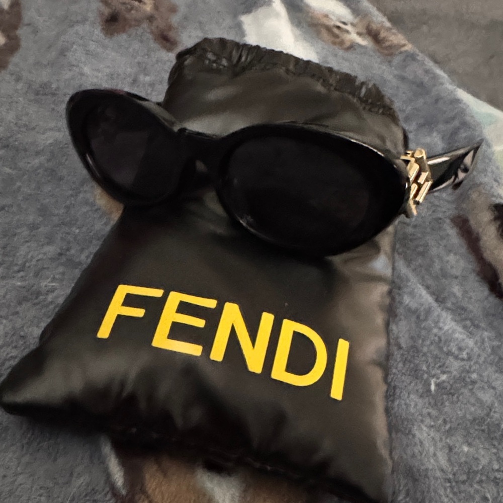 Fendi Black Oval Sunglasses with Gold Logo Temples